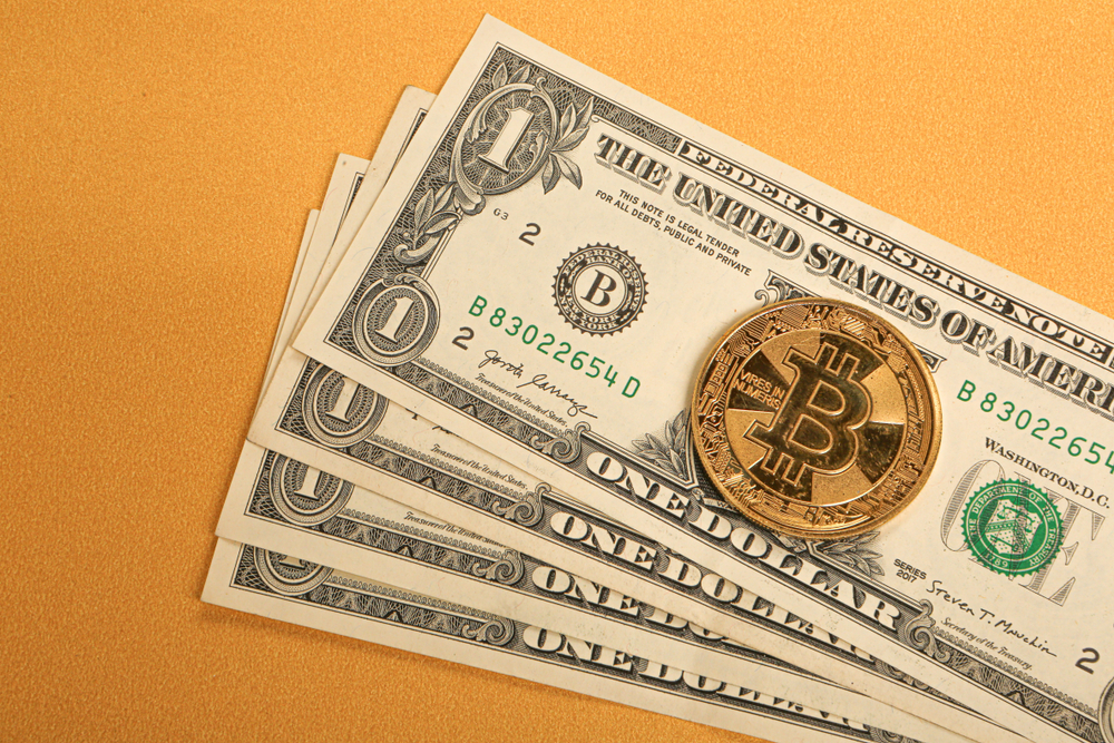 Dólar e bitcoin