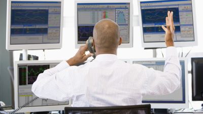 Stock,Trader,Talking,Animatedly,On,The,Phone
