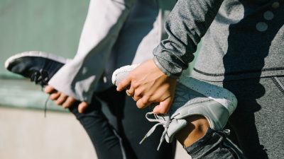 Women,Stretching,For,Warming,Up,Before,Running,Or,Working,Out.