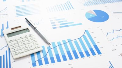 Accounting,Data,,Charts,,Calculator,And,Pen.,Many,Charts,And,Graphs.
