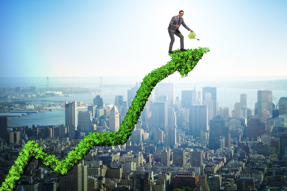 Businessman,In,Investment,Concept,Watering,Financial,Line,Chart