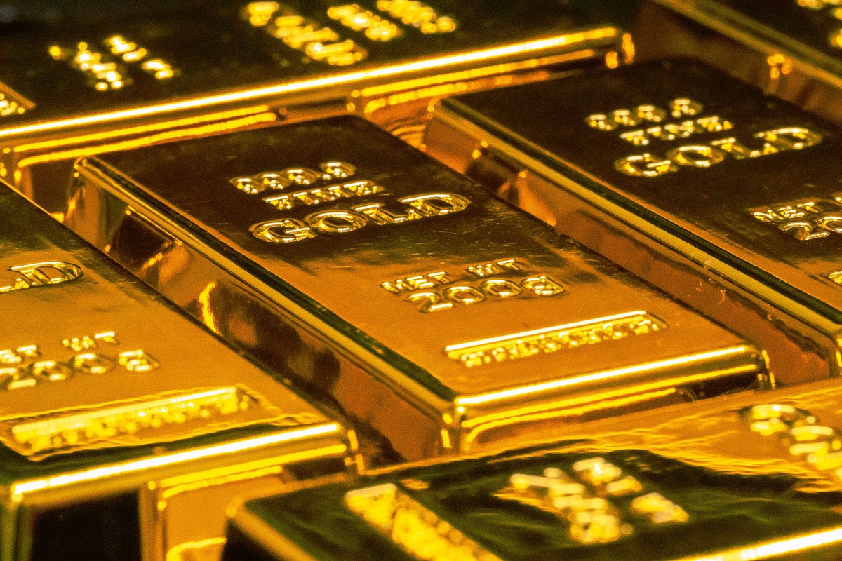 Foto mostrando barras de ouro; a Aura (AURA33) é uma mineradora focada nessa commodity