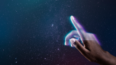 uma mão entrando no metaverso, o universo digital das criptomoedas