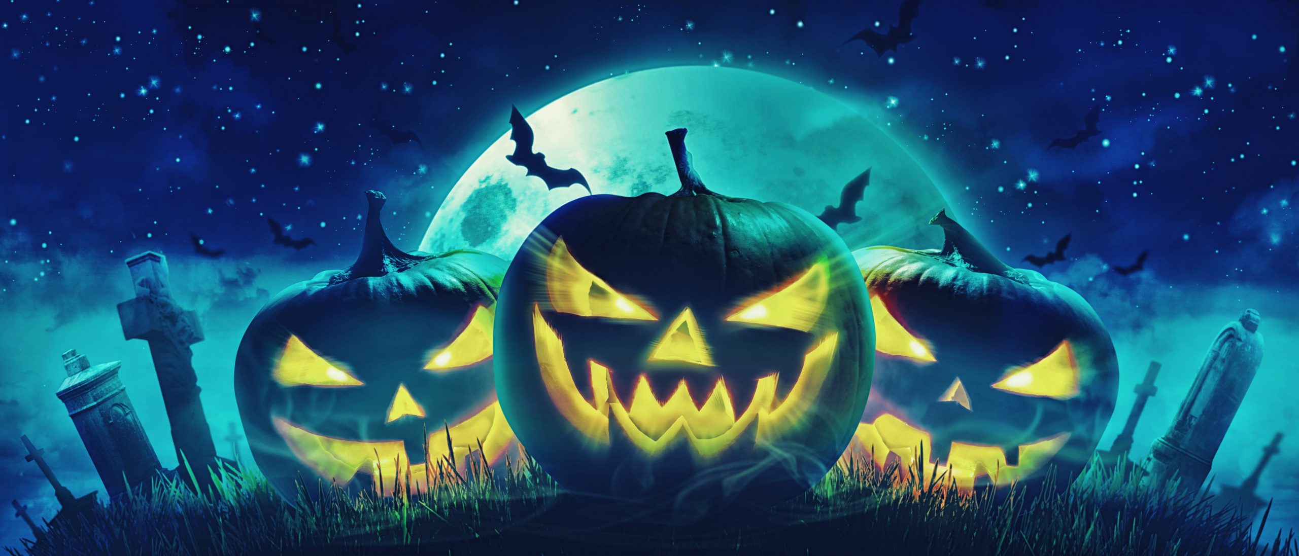 Halloween Motiv mit Kürbisen auf dem Friedhof