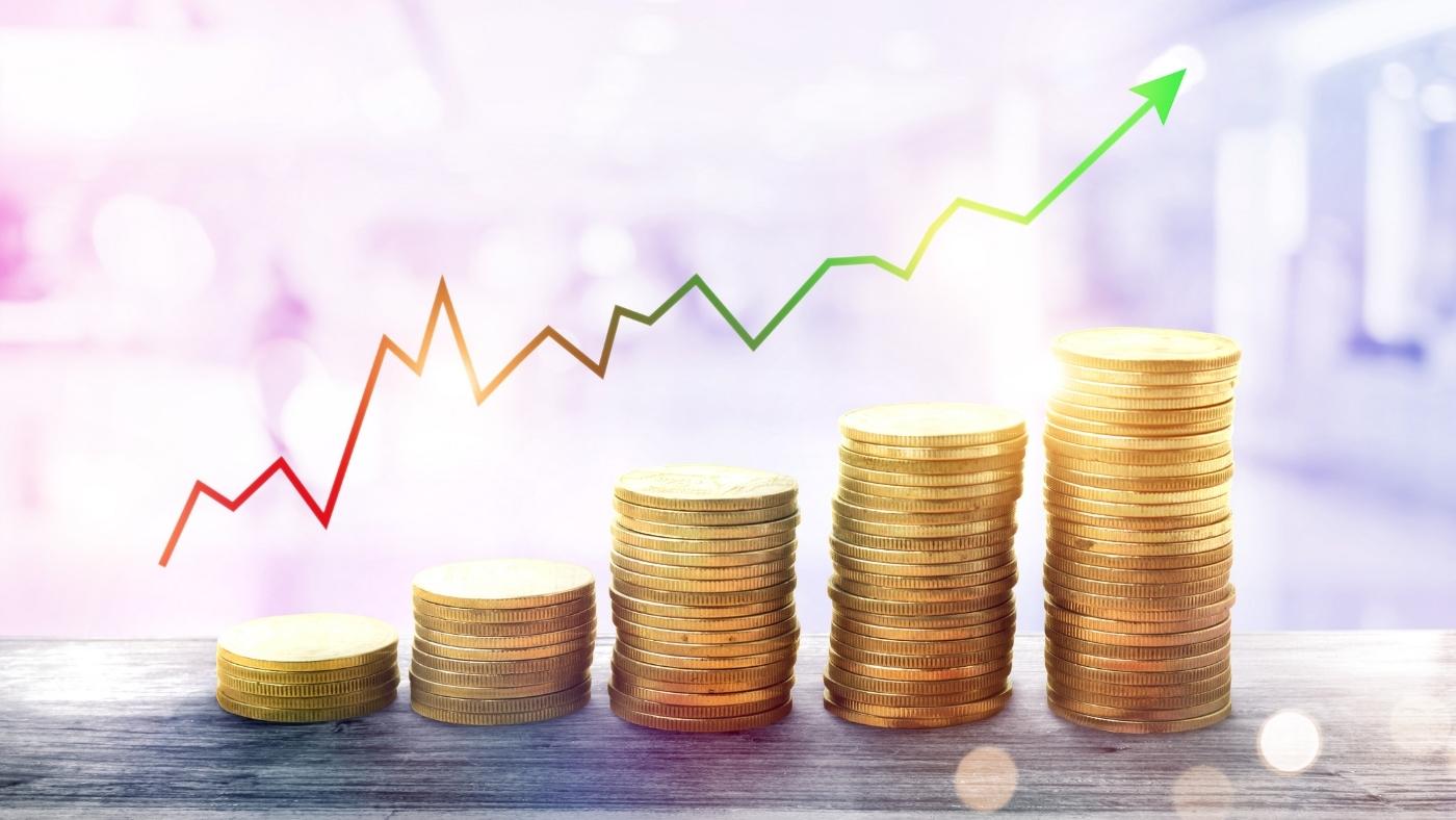 Moedas com um grafico de ações dividendos