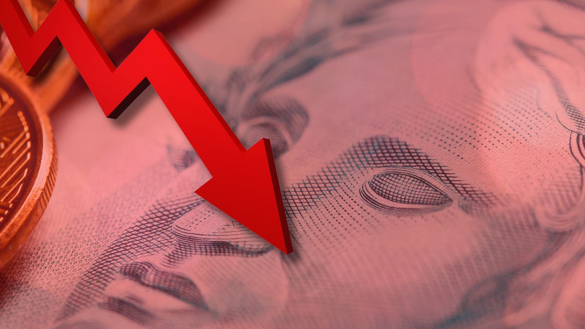 Real desvalorizado Nota de 100 reais e seta vermelha