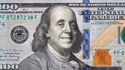 Imagem de uma nota de dólar sorrindo