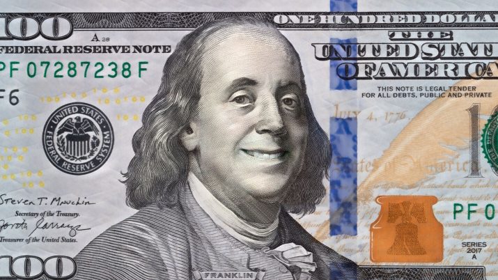 Imagem de uma nota de dólar sorrindo