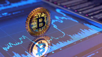 Bitcoin sign – business graph background. Crypto concept – market volatility.