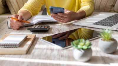 Woman Setting Financial Goals at Home.