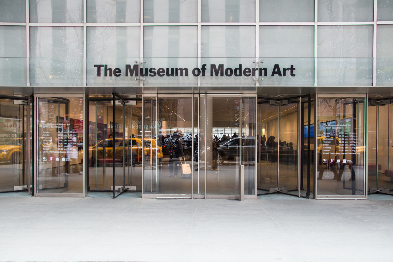 New York City, New York, USA - March 14, 2014: Street view of Museum of Modern Art in Manhattan.  The MoMA was founded in 1929.