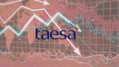 gráfico de ações apontando queda com a logo da taesa ao centro
