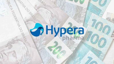 Montagem logo da Hypera (HYPE3) sobre notas de real