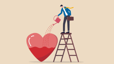 Work passion, motivation to success and win business competition, mindset or attitude to work in we love to do concept, businessman pouring water to fulfill heart shape metaphor of passion.