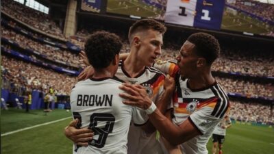 jogadores de futebol da alemanha comemorando gol