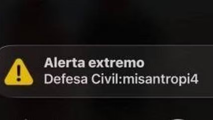 Alerta da defesa civil no celular, chamando a atenção para "misantropia"