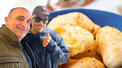 Harry Styles (à dir.) ao lado de fã em loja de pão de queijo paulistana