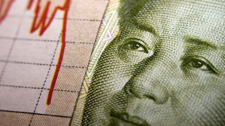 Gráfico do mercado de ações e nota de yuan da China