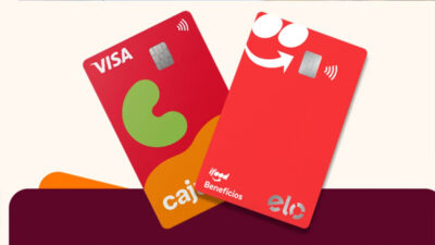 Dois cartões vermelhos de benefícios, um da Caju e outro do iFood, sobre fundo claro.